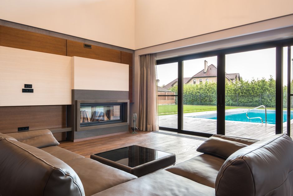 Professional installers fitting a new patio glass door